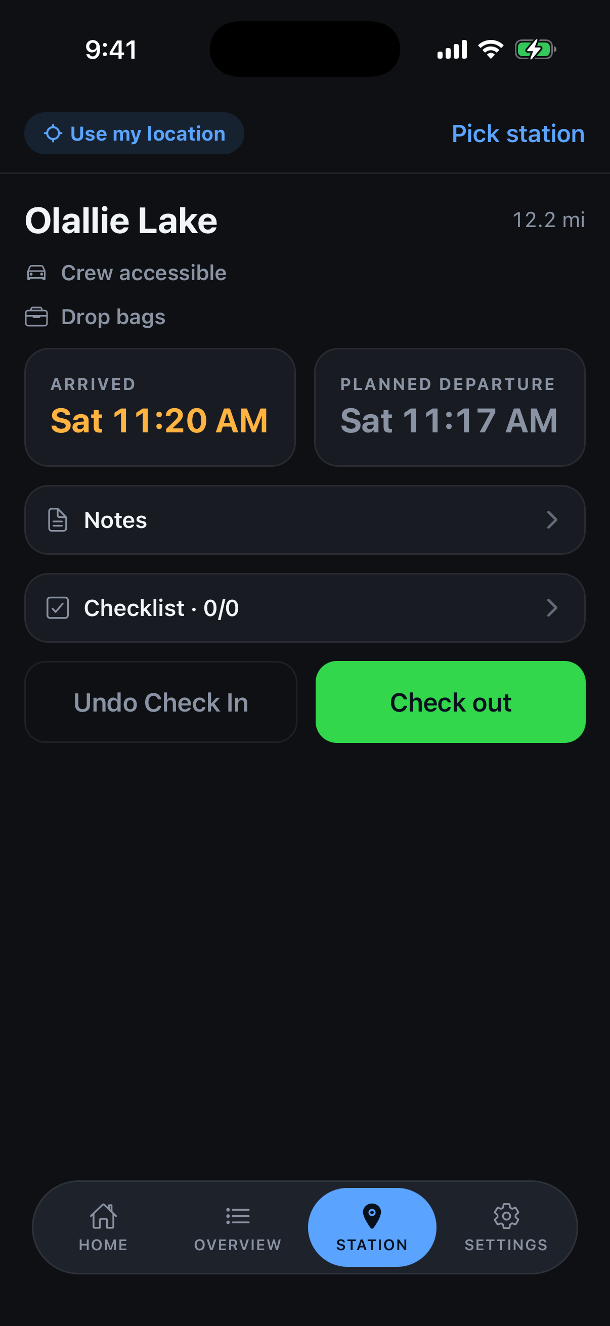 Aid Station screen with the Check in button and the live Trackleaders ETA beside the planned times